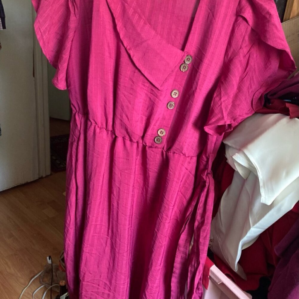 BloomChic V cut dress buttons down the front flowing sleeves